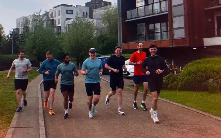 PACE athletes running side by side on a group training run